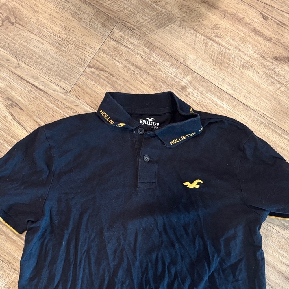 Hollister Men's Navy Polo with Yellow Accents